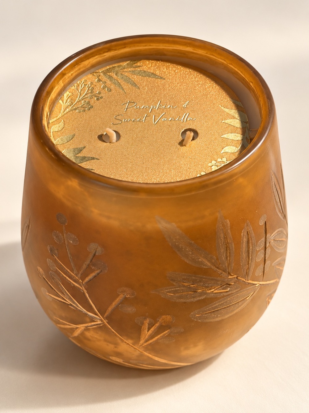 Anthropologie Gold pumpkin and Sweet Vanilla Embossed Glass Candle